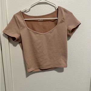 Cute ribbed shirt from Hollister! Never before worn, but still washed and clean.